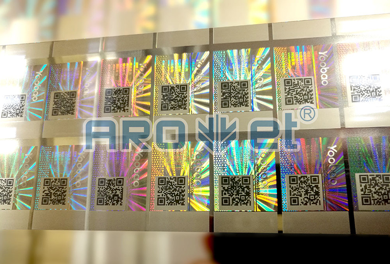 28圈X1双头喷码装备在镭射防伪标签上的应用